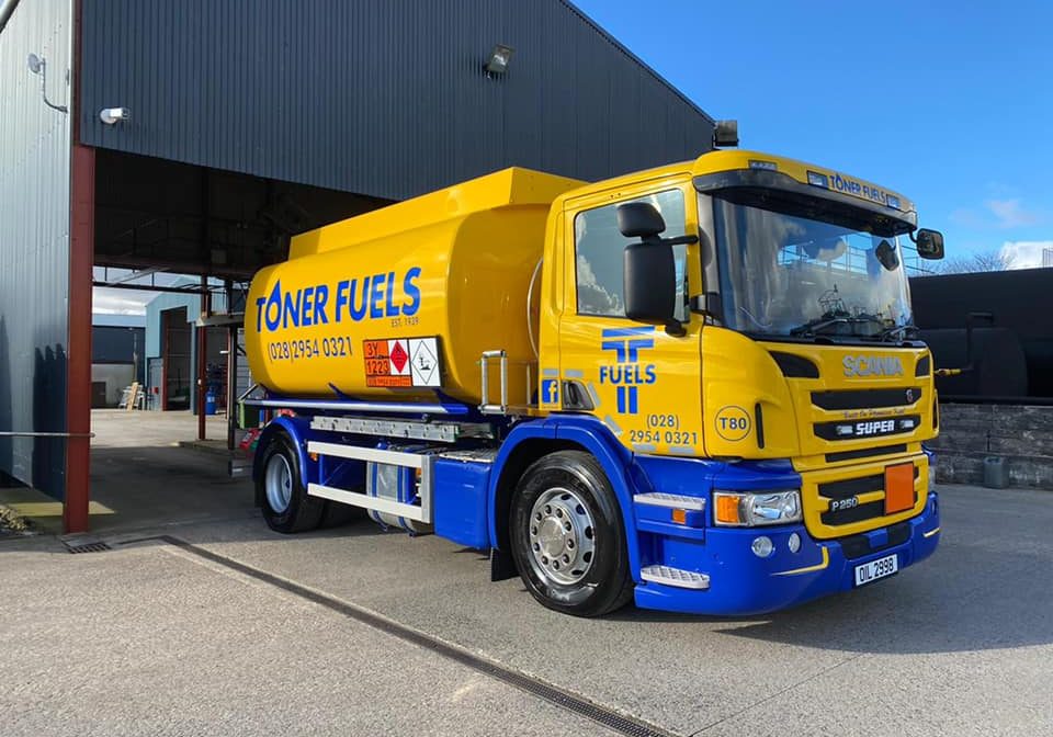 Toner fuels truck working at farm