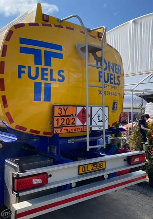 Toner fuels truck at commercial garden shop