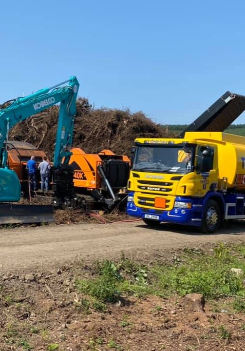 Toner fuels truck refuelling jcb